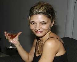 Callie Thorne consuming alcohol